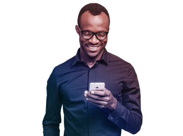 Person smiling while on mobile device.