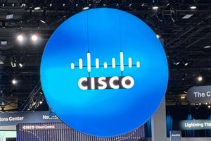 Cisco logo over a large blue, lighted orb on the show floor of Cisco Live!