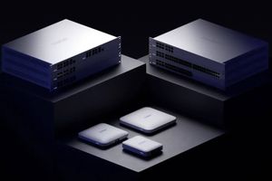 Group of white switches and routers under a spotlight