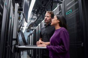 Man and woman in a data center