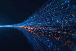 Abstract visualization of high-speed data transmission with blue light streams and glowing particles moving across a dark background.