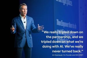 Jim Kavanaugh in a blue jacket speaking on stage, with text about AI partnership.
